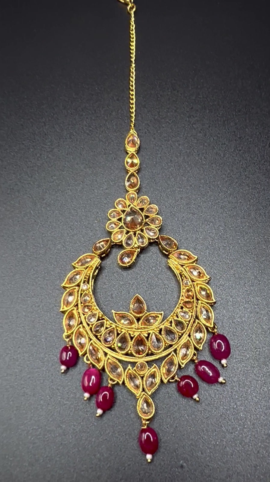 Gold and maroon maang Tika 